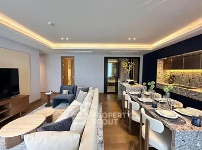 Luxurious open-plan living and dining area with modern decor and ambient lighting.