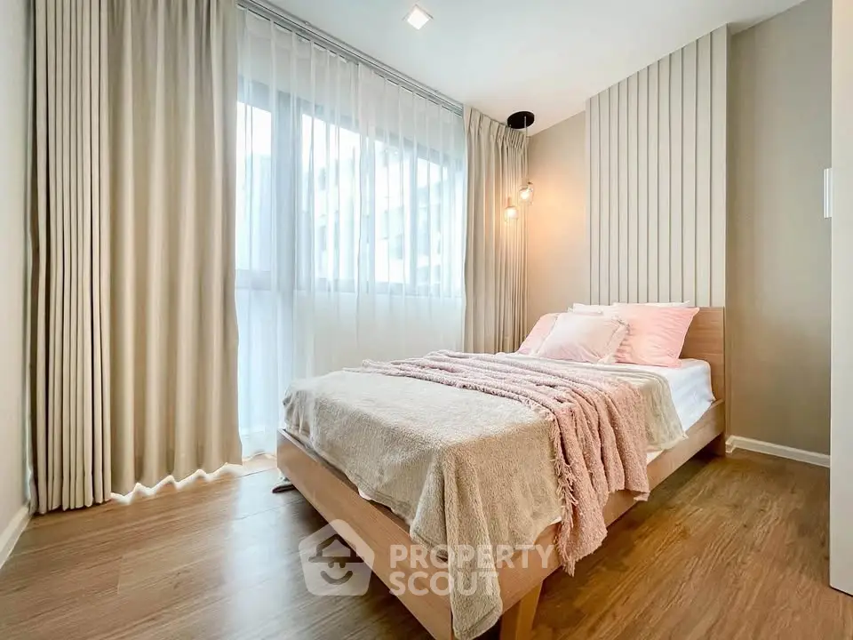 Cozy bedroom with modern decor and natural light