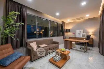 Luxurious modern living room with elegant decor and spacious layout, perfect for relaxation and entertainment.