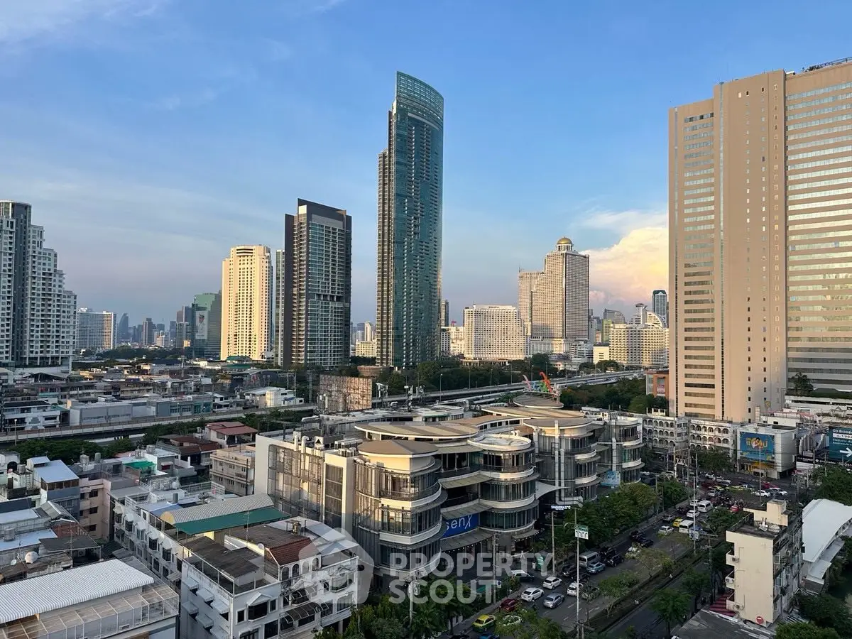 Stunning cityscape view showcasing modern skyscrapers and urban architecture at sunset.