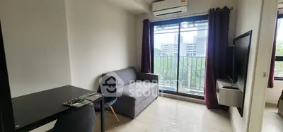 Modern living room with balcony view and sleek furniture