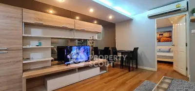 Modern living room with wooden flooring and stylish furniture in a cozy apartment