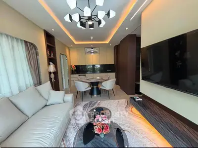 Luxurious modern living room with elegant decor and open kitchen layout