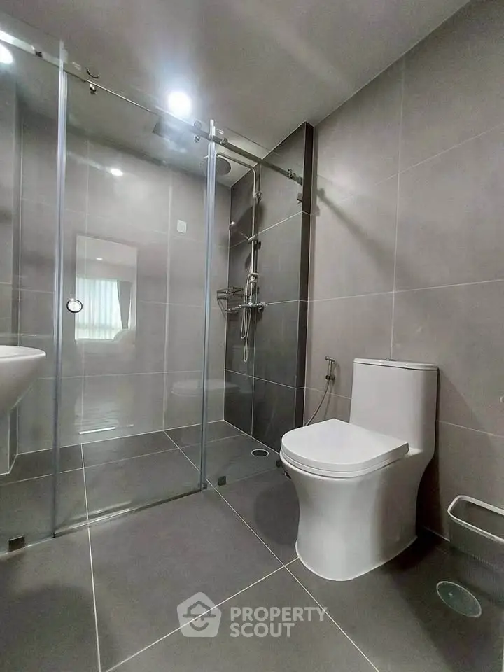 Modern bathroom with sleek design and glass shower enclosure
