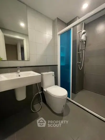 Modern bathroom with sleek shower and contemporary fixtures