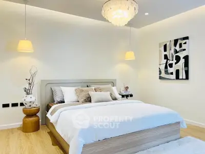 Elegant bedroom with modern decor and cozy lighting