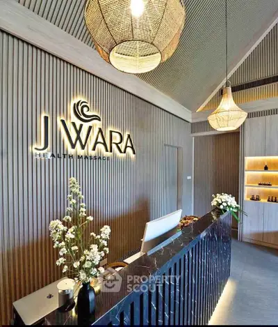 Luxurious spa reception area with elegant lighting and modern decor, perfect for relaxation and wellness.