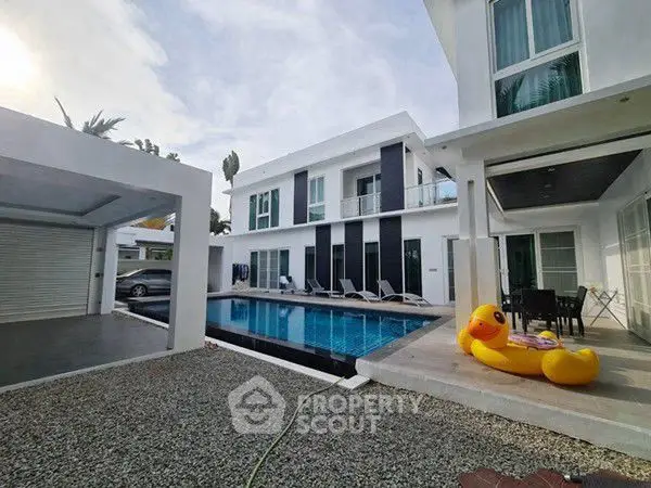 Luxurious modern villa with private pool and spacious outdoor area, perfect for relaxation and entertainment.