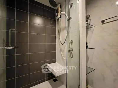 Modern bathroom with sleek shower design and elegant tile work