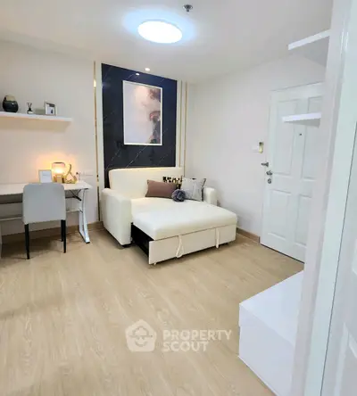 Modern living room with stylish decor and cozy seating area