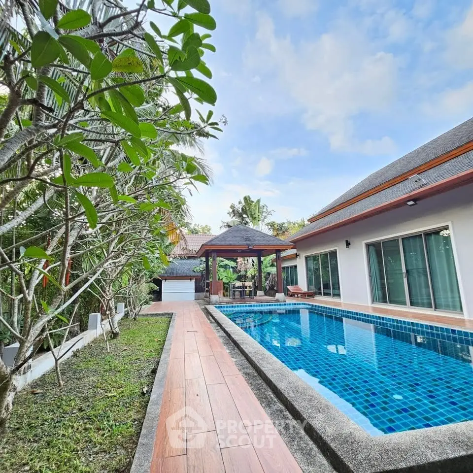 Luxurious villa with private pool and lush garden, perfect for serene living.