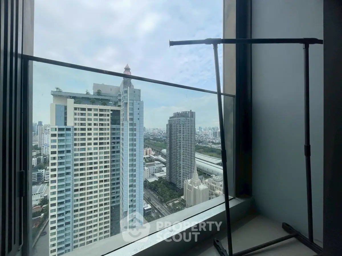 Stunning cityscape view from high-rise apartment window