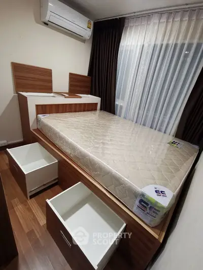 Cozy bedroom with modern furniture and ample storage space