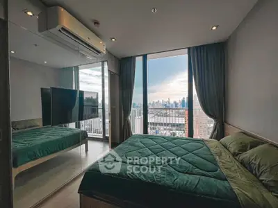 Luxurious bedroom with stunning city view and modern decor