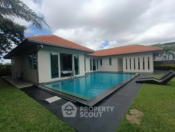 Luxurious villa with private pool and lush garden, perfect for serene living.