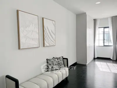 Elegant modern living room with stylish decor and natural light