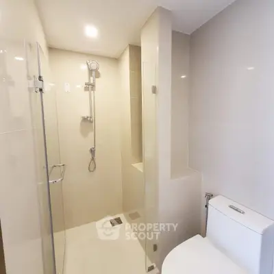 Modern bathroom with sleek shower and elegant fixtures