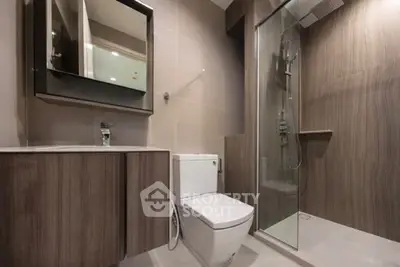 Modern bathroom with sleek design and glass shower enclosure