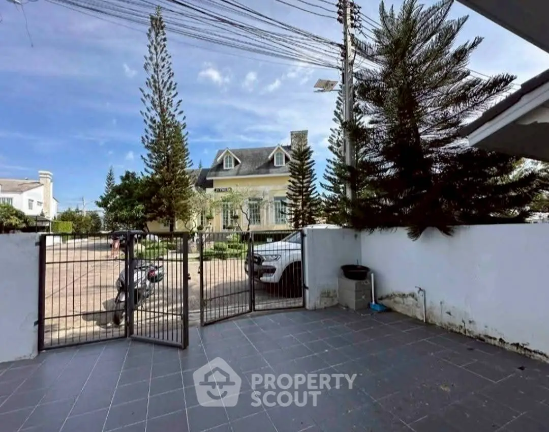 Charming property with spacious outdoor area and elegant building view.