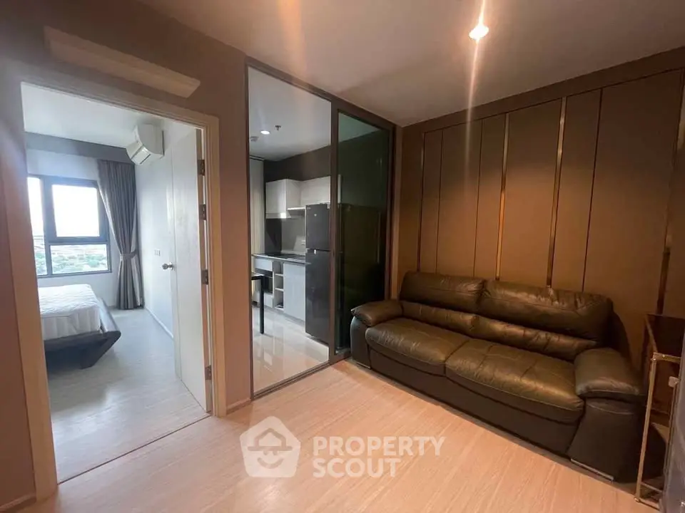 Modern apartment with cozy living room and sleek kitchen design