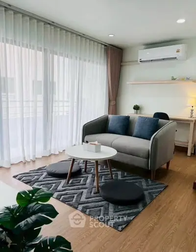 Modern living room with stylish decor and natural light