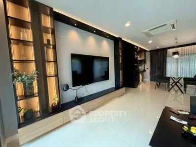 Luxurious modern living room with sleek design and built-in shelving, perfect for stylish urban living.
