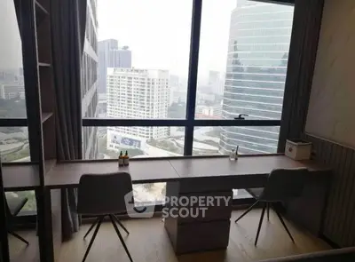 Modern study room with panoramic city view and sleek furniture