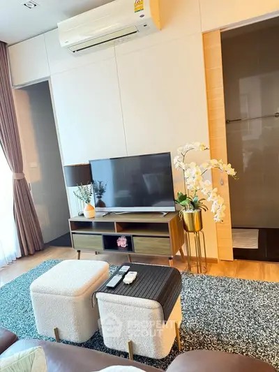 Stylish living room with modern TV setup and elegant decor
