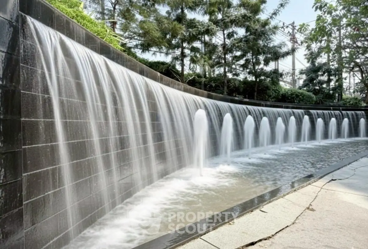 Stunning garden waterfall feature in luxury real estate setting