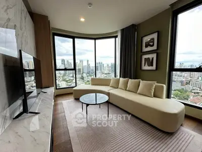 Luxurious living room with panoramic city views and modern decor
