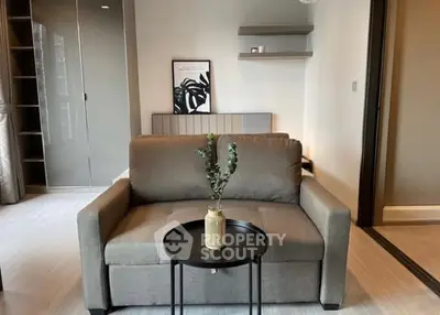 Modern living room with stylish sofa and decorative shelves