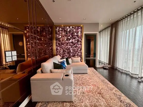 Luxurious living room with elegant decor and floor-to-ceiling windows