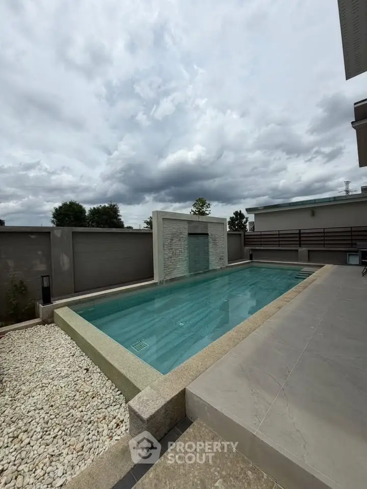 Luxurious private pool with modern design and serene surroundings, perfect for relaxation and entertainment.