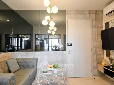 Stylish modern living room with elegant lighting and chic decor