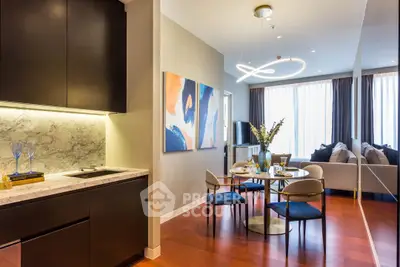 Luxurious open-plan living room with modern kitchen and elegant dining area.