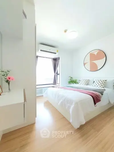 Bright and cozy bedroom with modern decor and natural light