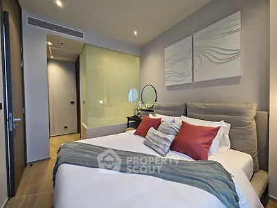 Luxurious modern bedroom with stylish decor and cozy ambiance, perfect for relaxation and comfort.