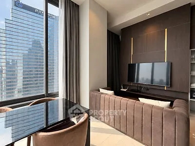 Luxurious modern living room with stunning city view and elegant furnishings