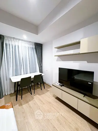 Modern living room with sleek furniture and natural light