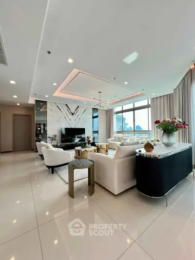 Luxurious modern living room with elegant decor and stunning city view, featuring plush seating and stylish accents.