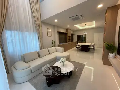 Luxurious modern living room with elegant dining area and stylish decor