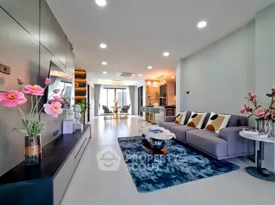 Spacious modern living room with stylish decor and open layout