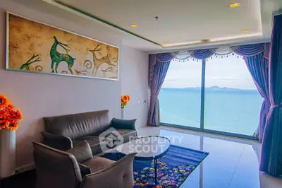 Luxurious living room with stunning ocean view and elegant decor