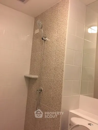Modern bathroom with sleek shower design and elegant tile work