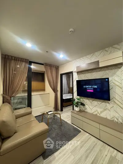 Modern living room with stylish decor and wall-mounted TV