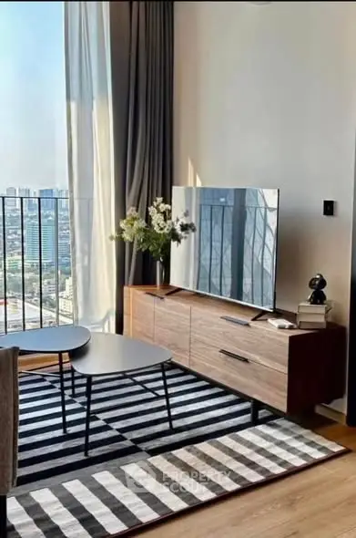 Stylish living room with city view, modern furniture, and elegant decor