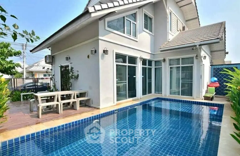 Stunning modern house with private pool and spacious patio, perfect for luxurious outdoor living.