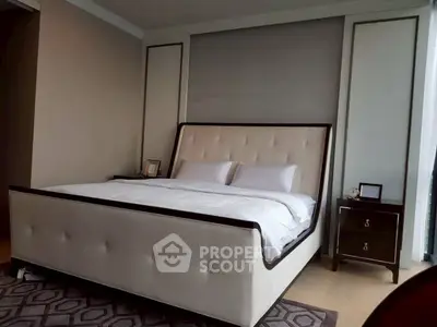 Luxurious bedroom with elegant bed and stylish decor, perfect for a serene retreat.