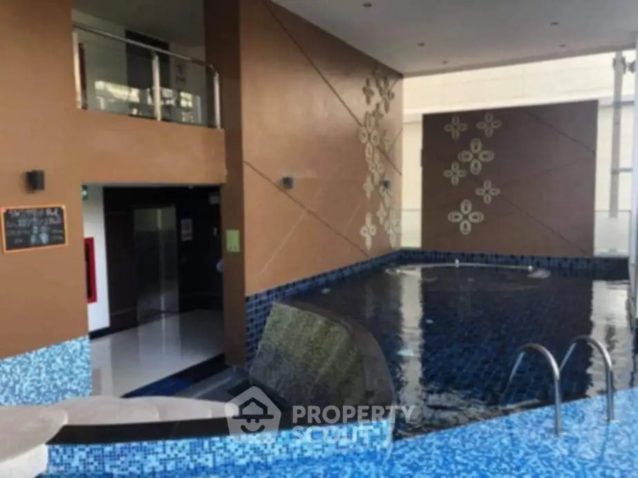 Luxurious indoor pool with modern design and elegant decor