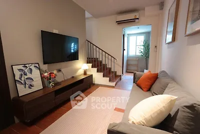 Charming living room with modern decor and cozy ambiance